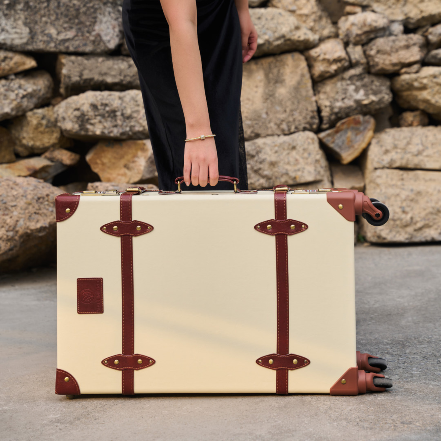 24"medium hard shell luggage with vegan leather exterior finish detail