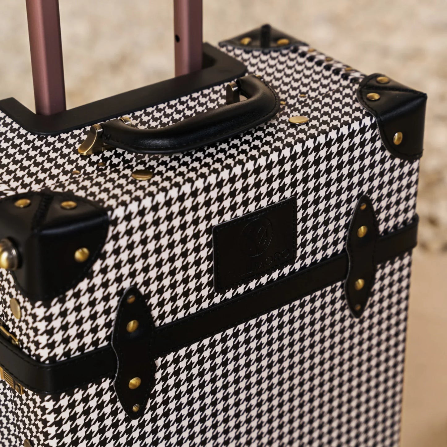 20 inch carry on hard shell luggage with textile exterior finish detail