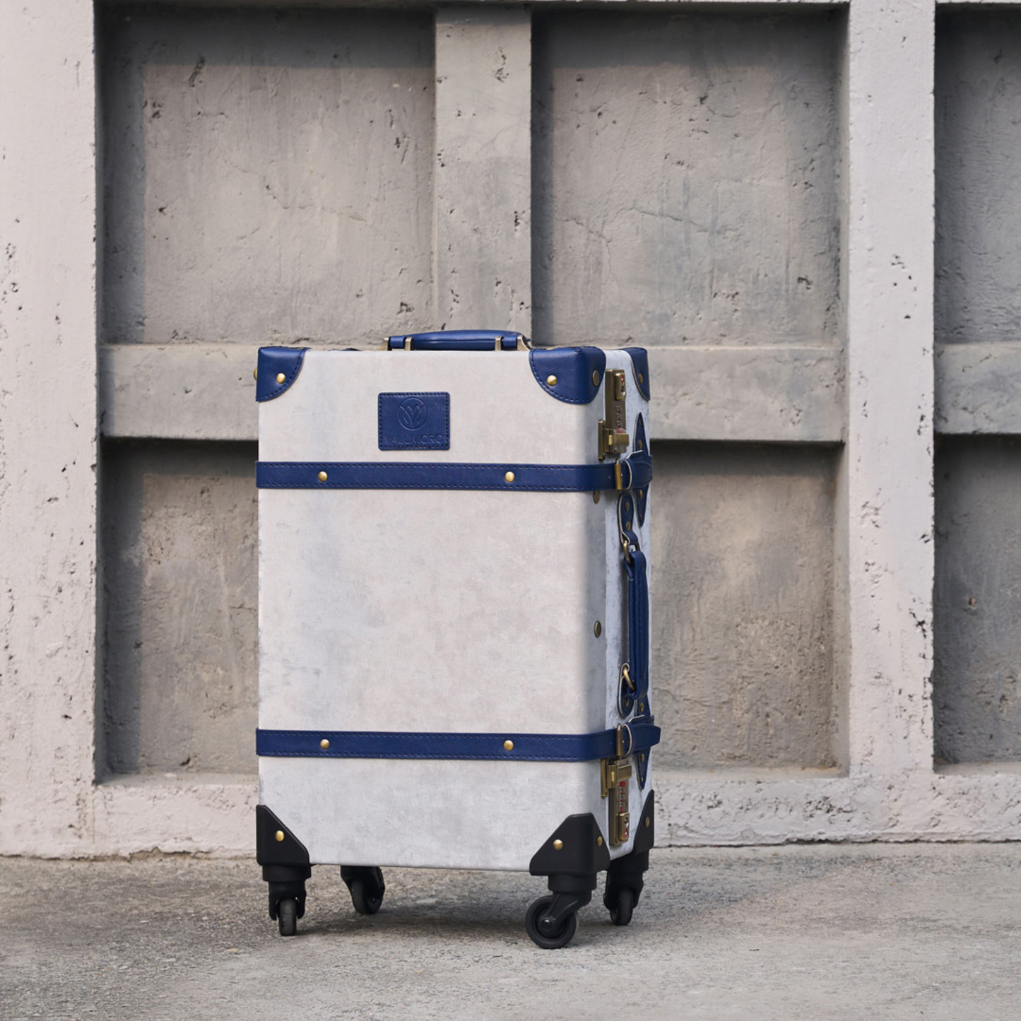 carry on hard shell luggage with vegan leather exterior finish detail