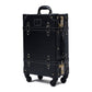 Black suitcase with gold accents on a white background , its a  20 inch carry on hard shell luggage side view durable structured build