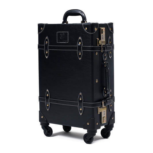 Black suitcase with gold accents on a white background , its a  20 inch carry on hard shell luggage side view durable structured build